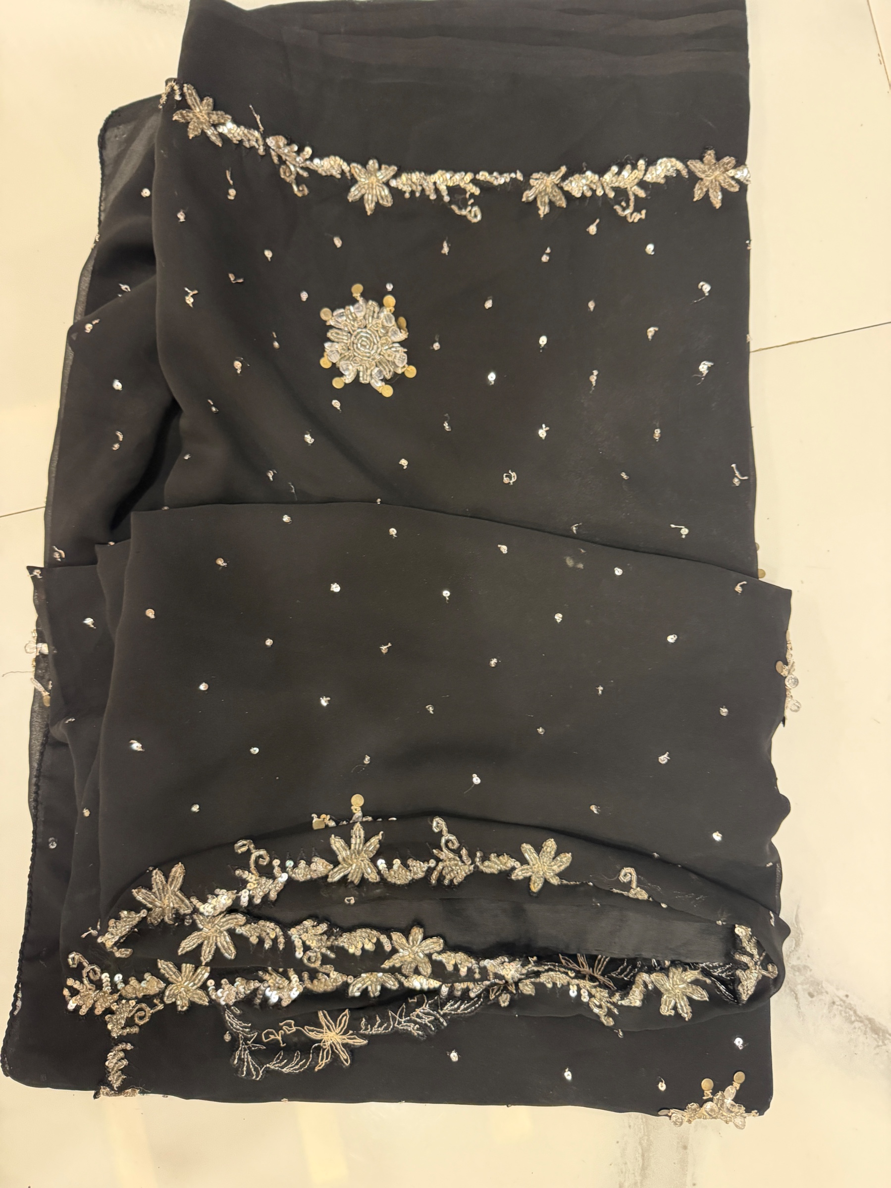 Black saree with stone border — pre-loved Ethnic Wear on Slayyitt