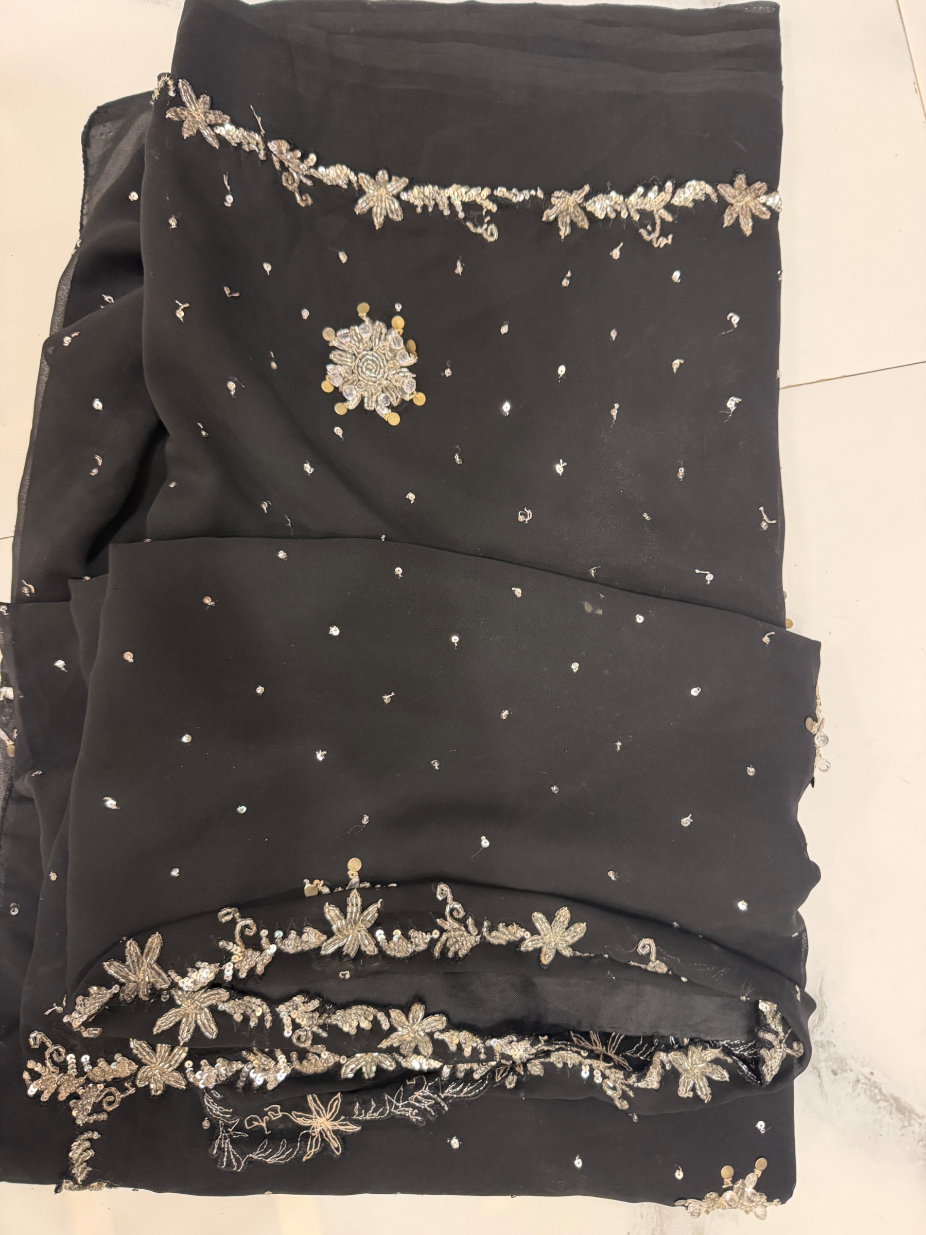 Black saree with stone border — pre-loved Ethnic Wear on Slayyitt