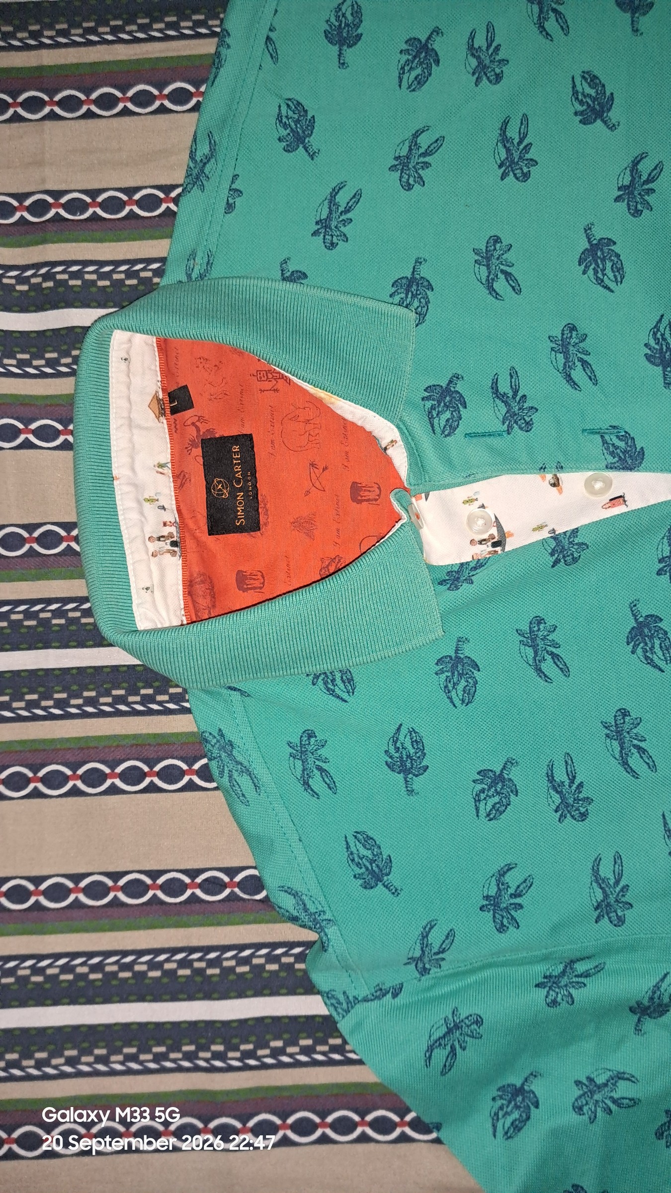 Simon Carter ( London) teal printed polo tshirt — pre-loved Tops on Slayyitt