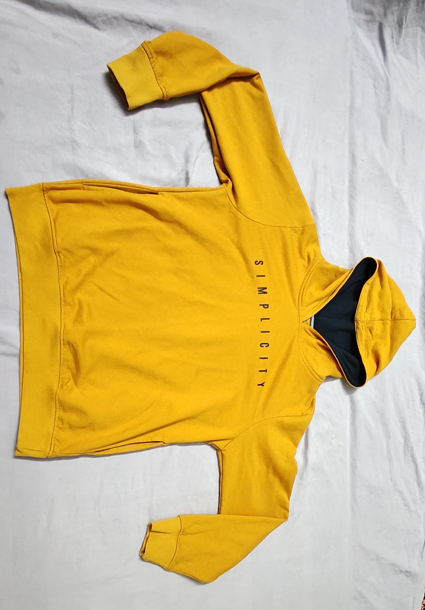 Yellow "SIMPLICITY" Graphic Pullover Hoodie with Black Accents — pre-loved Tops on Slayyitt