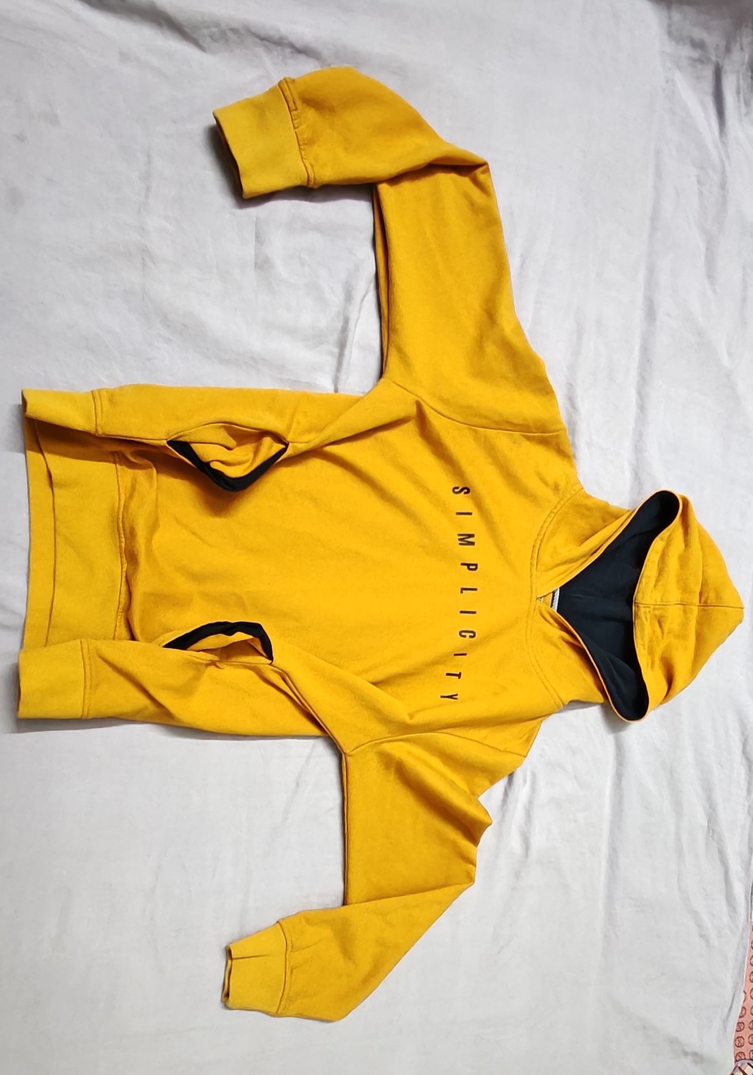Yellow "SIMPLICITY" Graphic Pullover Hoodie with Black Accents — pre-loved Tops on Slayyitt