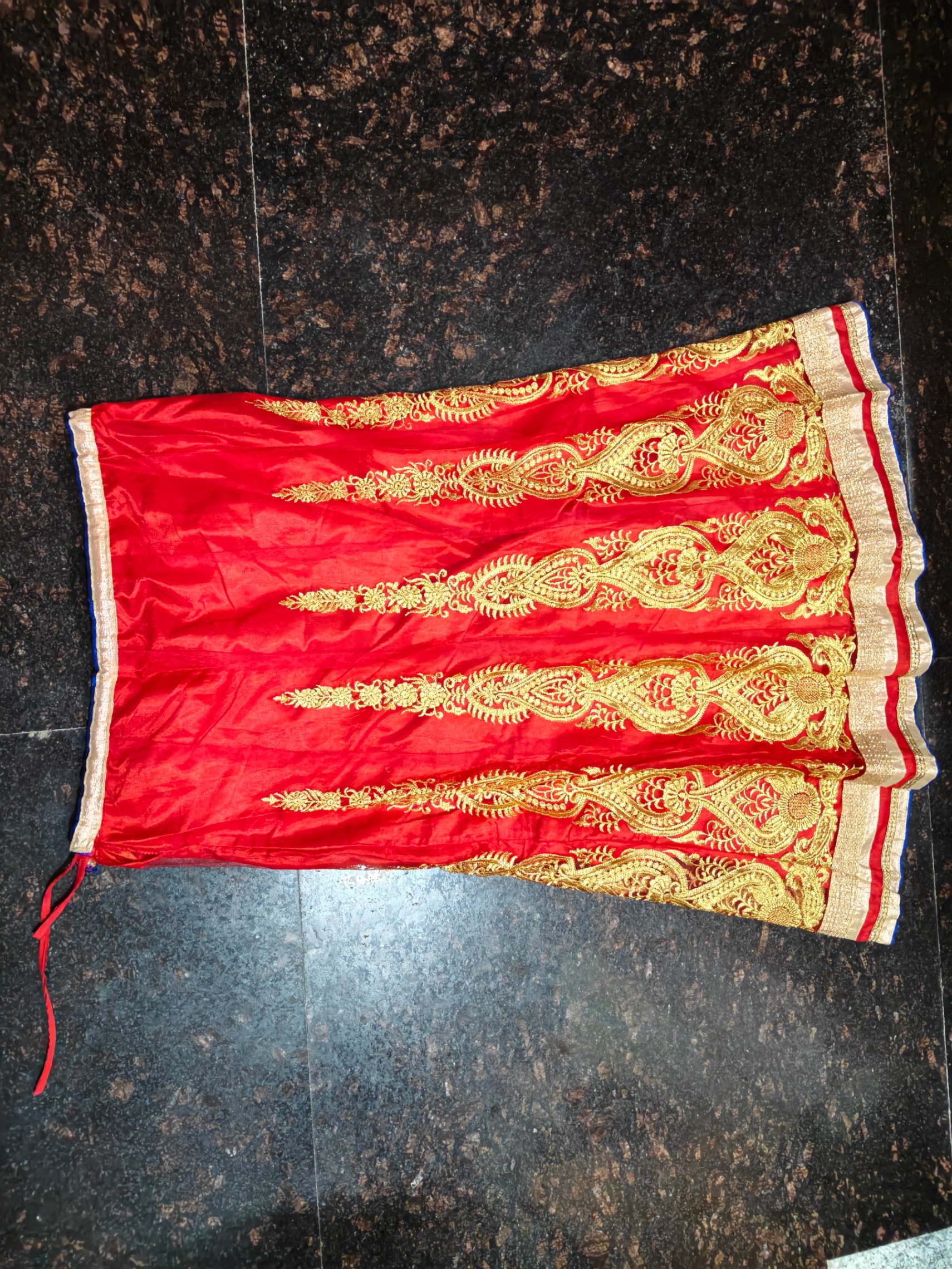 A bright red lehenga — pre-loved Indian Festival & Wedding Wear on Slayyitt