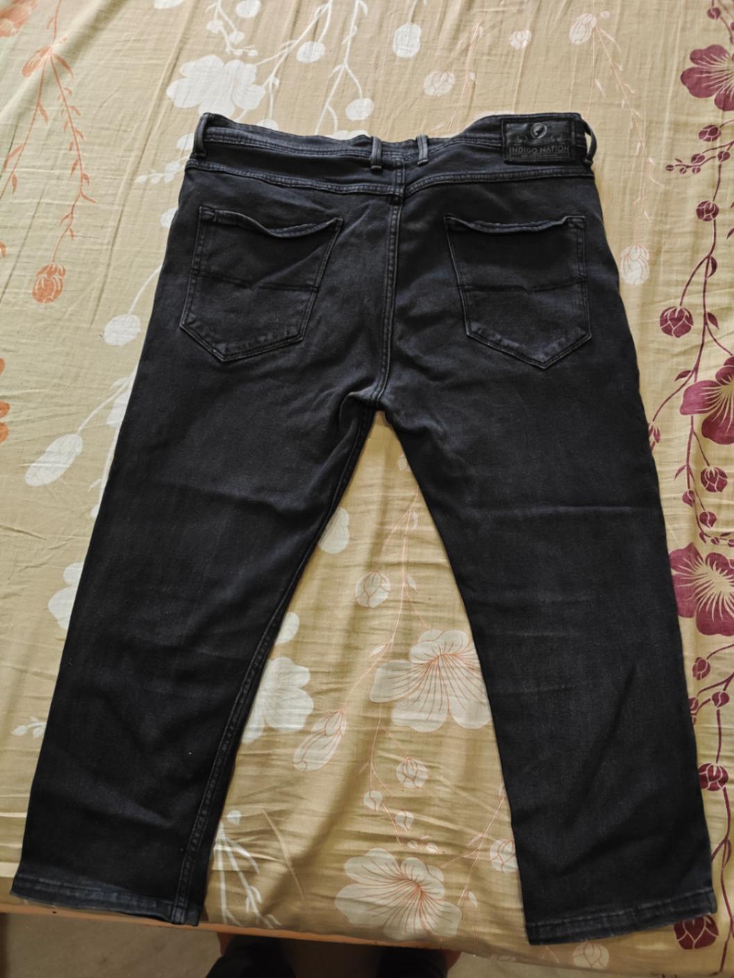 Black denim Jeans brand Indigo Nation — pre-loved Bottoms on Slayyitt