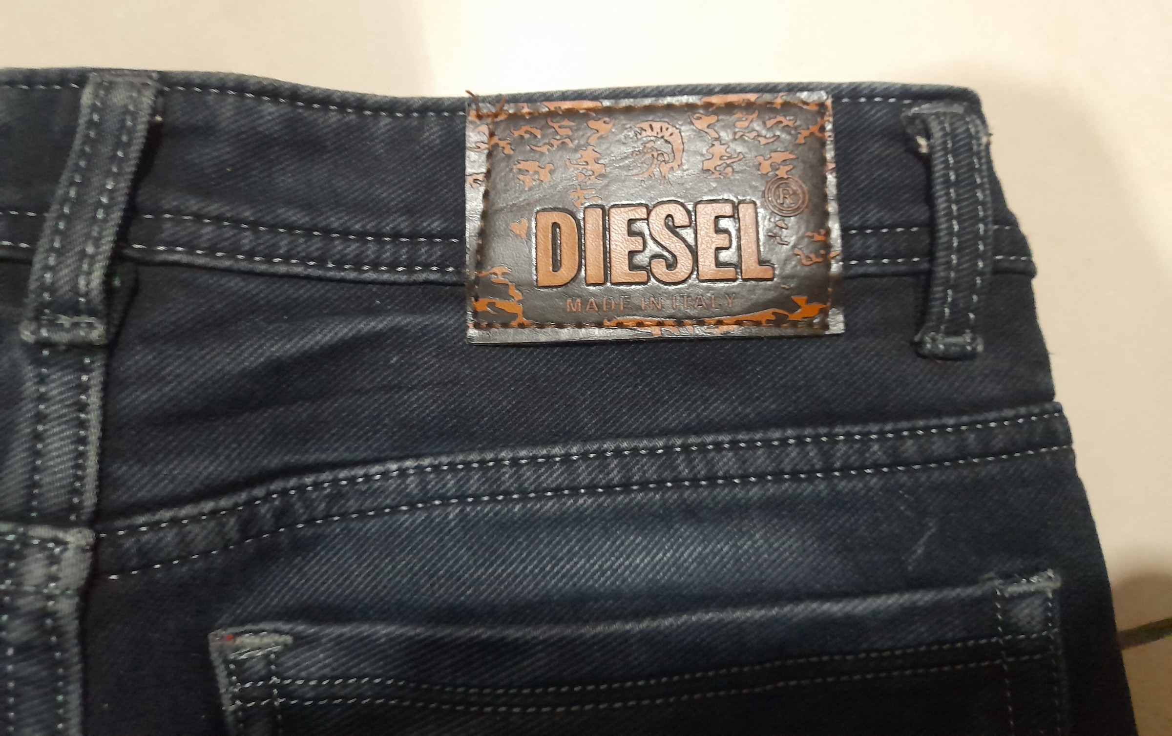 Diesel Men's Tappered Jeans — pre-loved Bottoms on Slayyitt