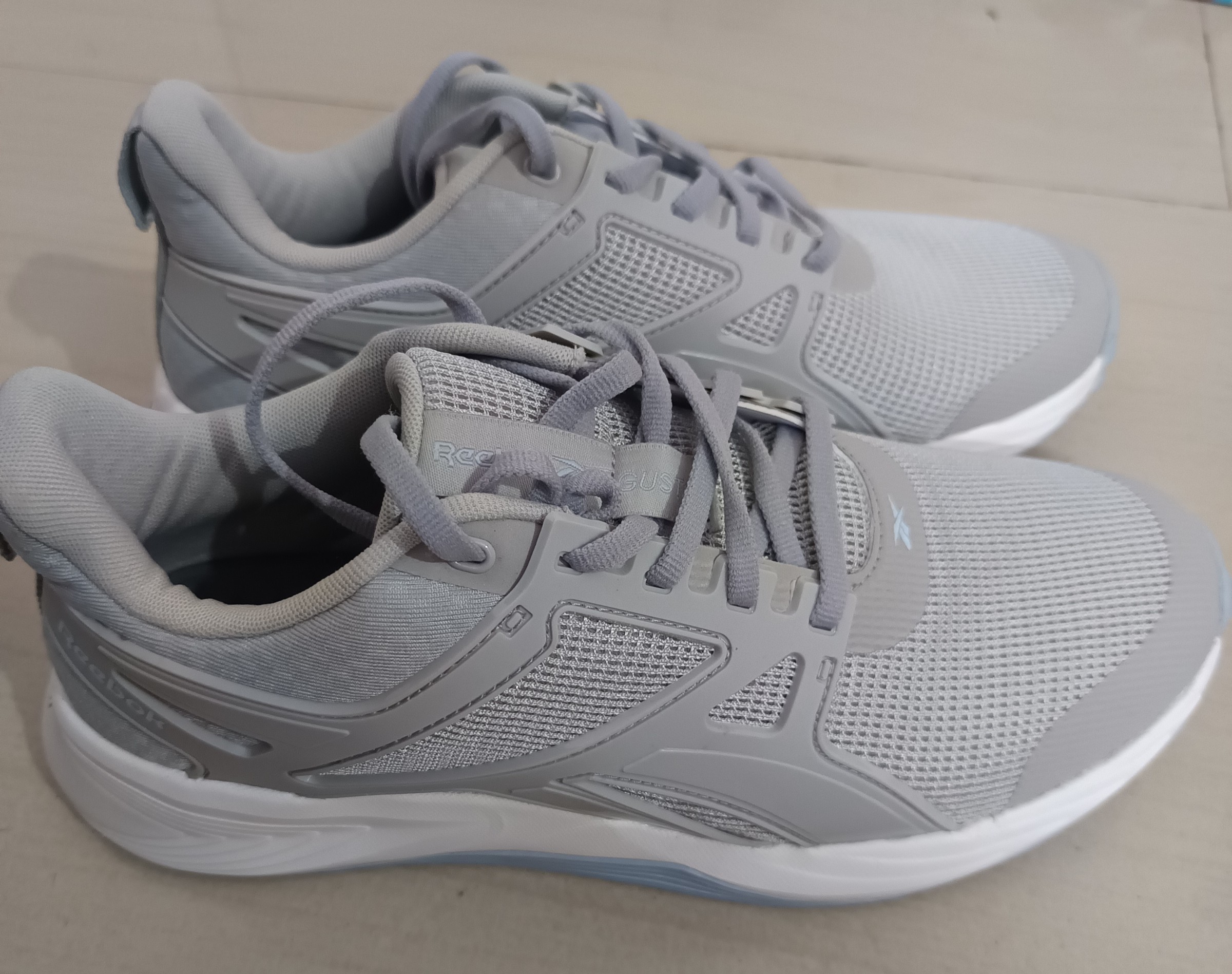 Reebok grey sport shoes — pre-loved Footwear on Slayyitt
