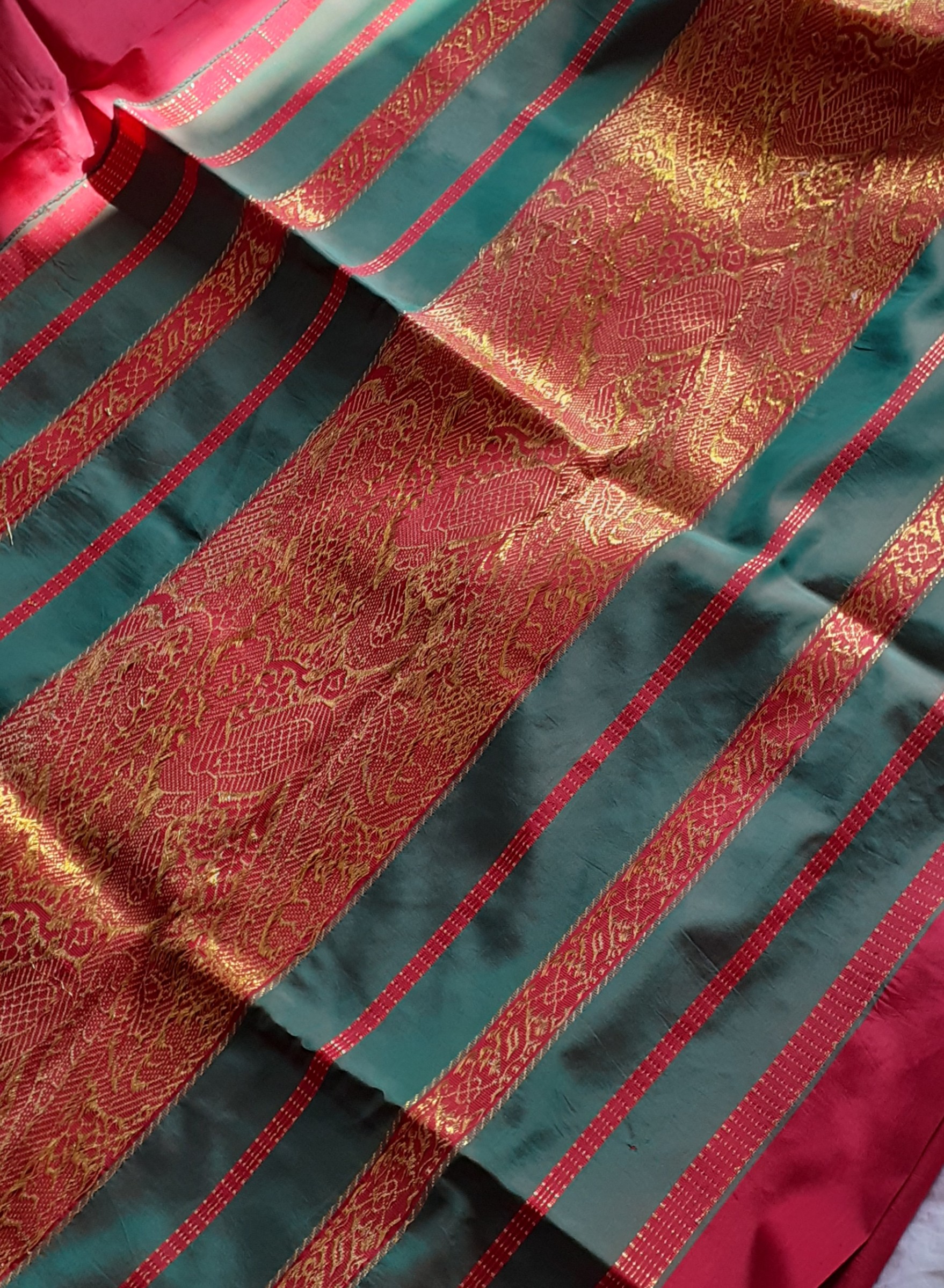 Wine coloured saree with gold ethnic motifs — pre-loved Ethnic Wear on Slayyitt